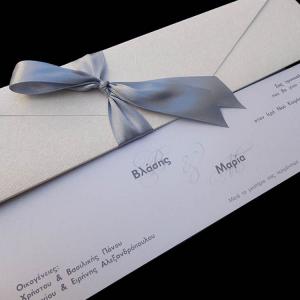 Προσκλητήρια γάμου -Γ1319 - <p>Μακρόστενος φάκελος με δερματίνη nature white και γκρι λεπτομέρειες.</p>...